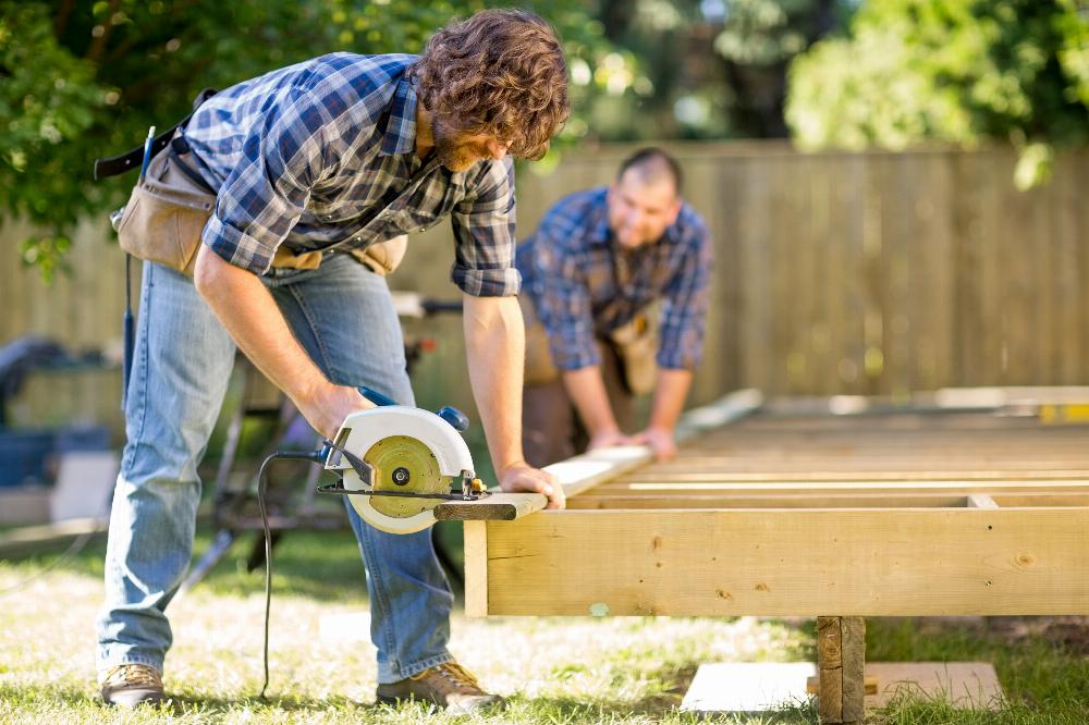 Contractors Cut Wood for Deck